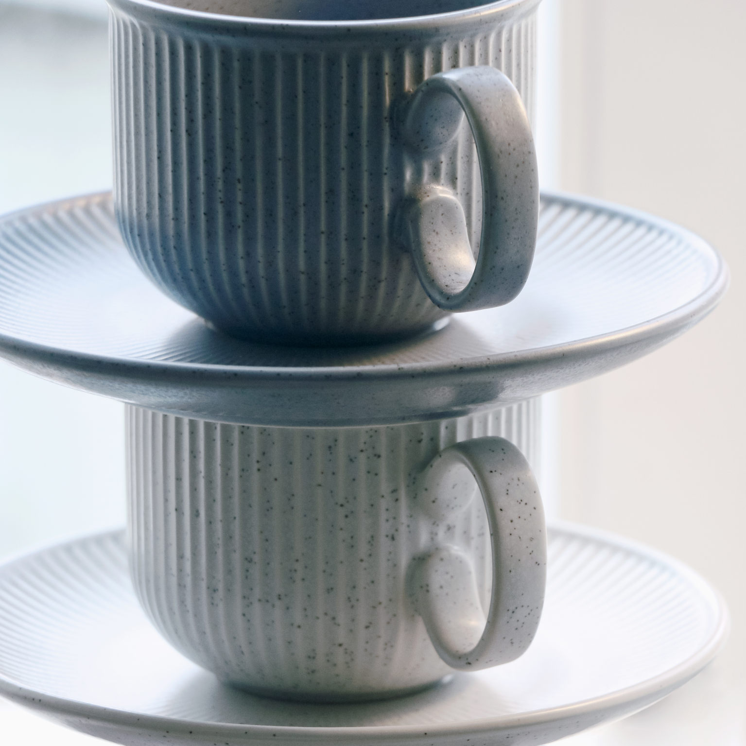 Thomas Clay cups in blue and light gray